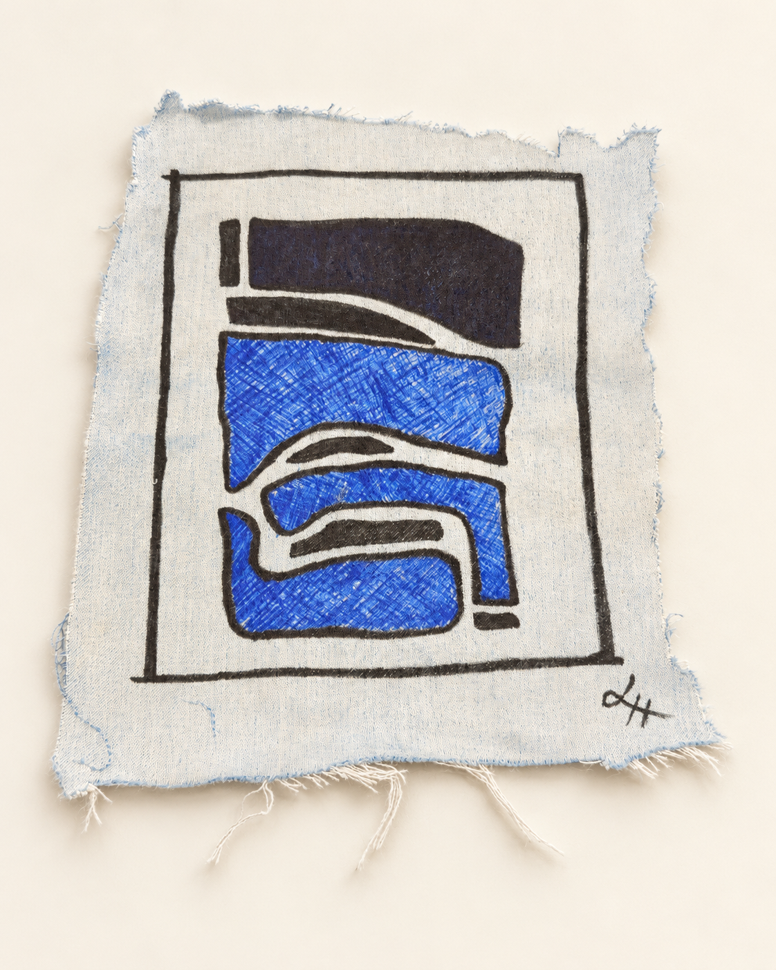 Flowing blue and black shapes enclosed by a hand-drawn border on pale, frayed textile.